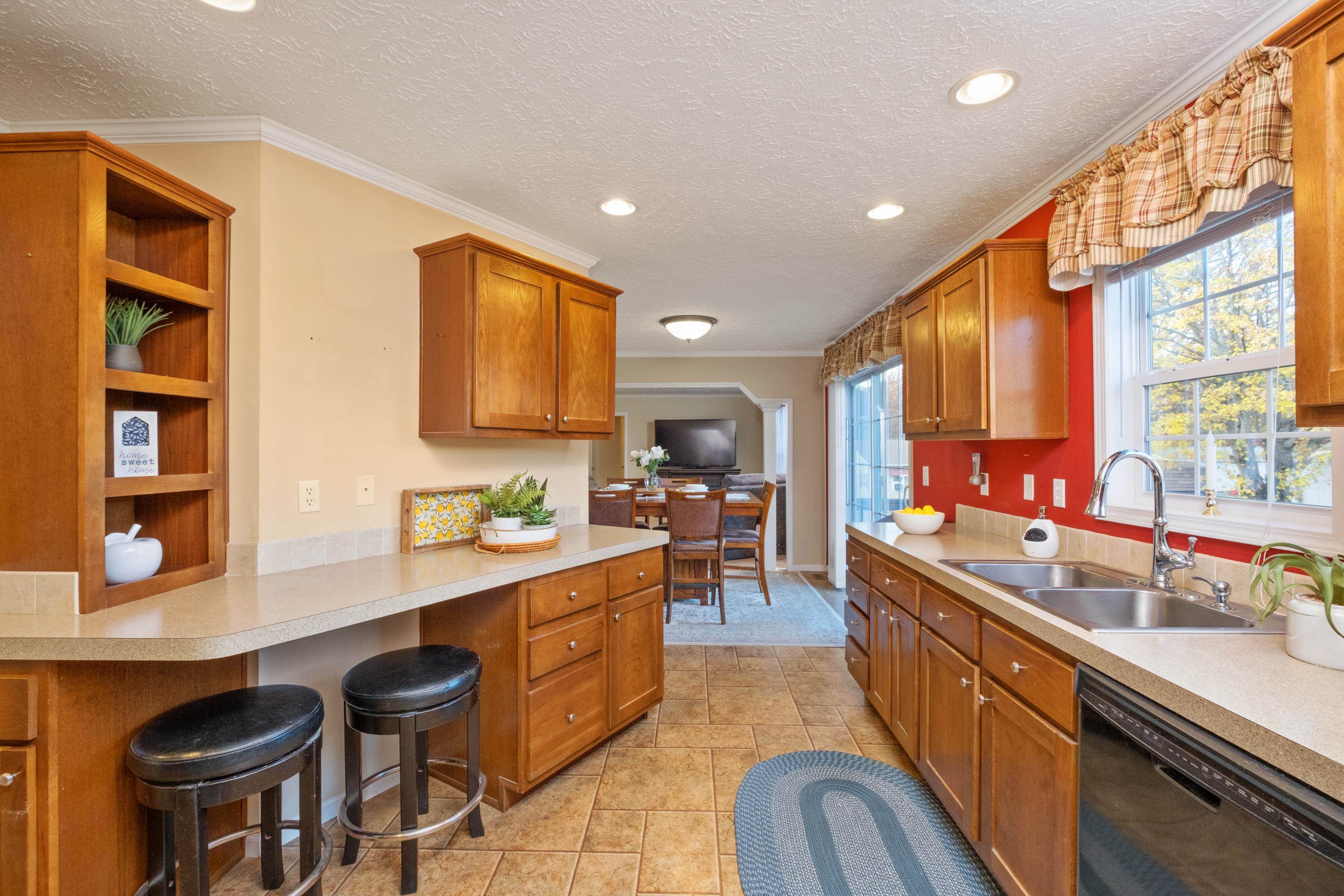 1715 3rd Street Waynesboro, VA 22980 - Photo 17 of 33 a kitchen with stainless steel appliances granite countertop sink stove and cabinets