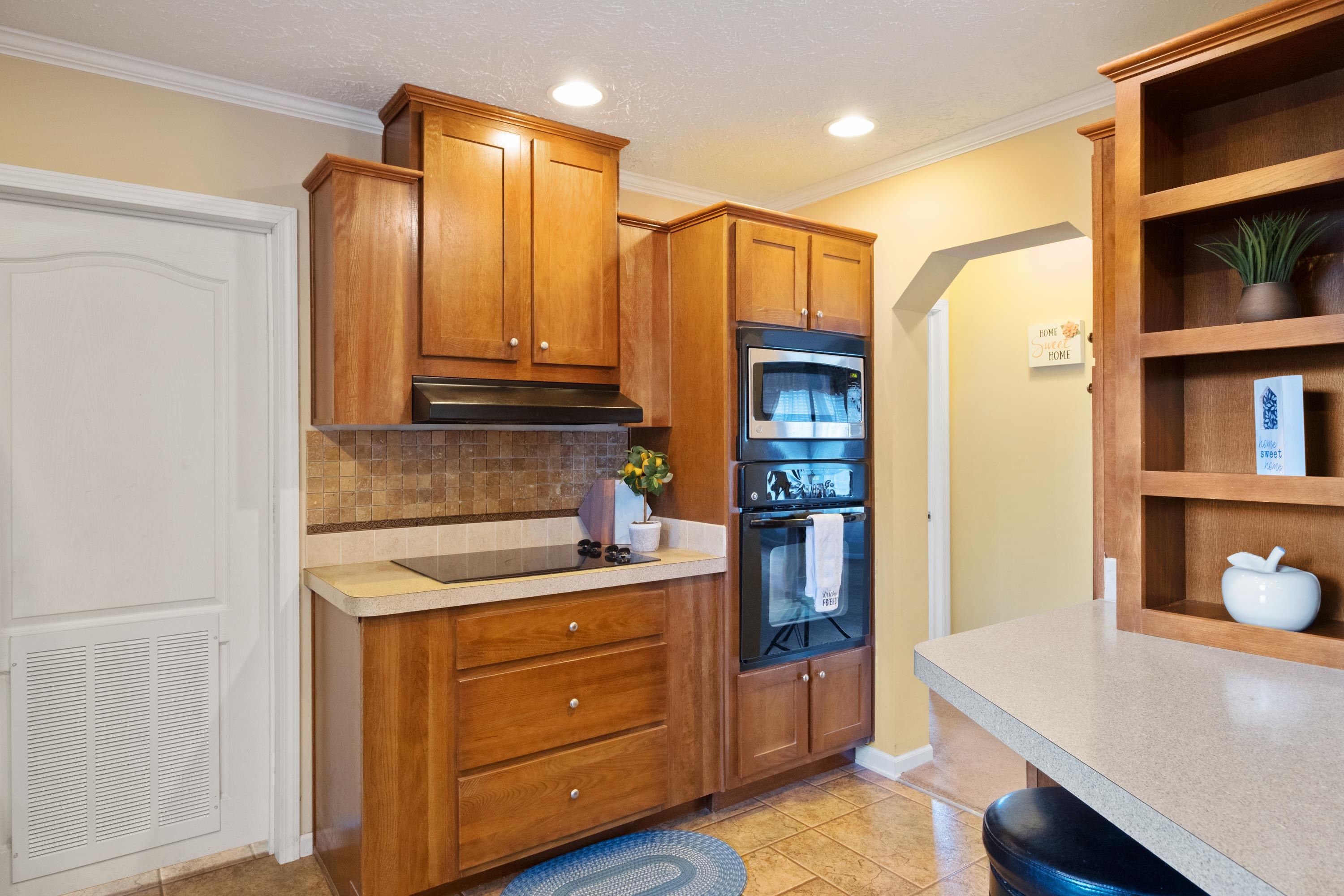 1715 3rd Street Waynesboro, VA 22980 - Photo 19 of 33 a bathroom with a sink a mirror and a shower