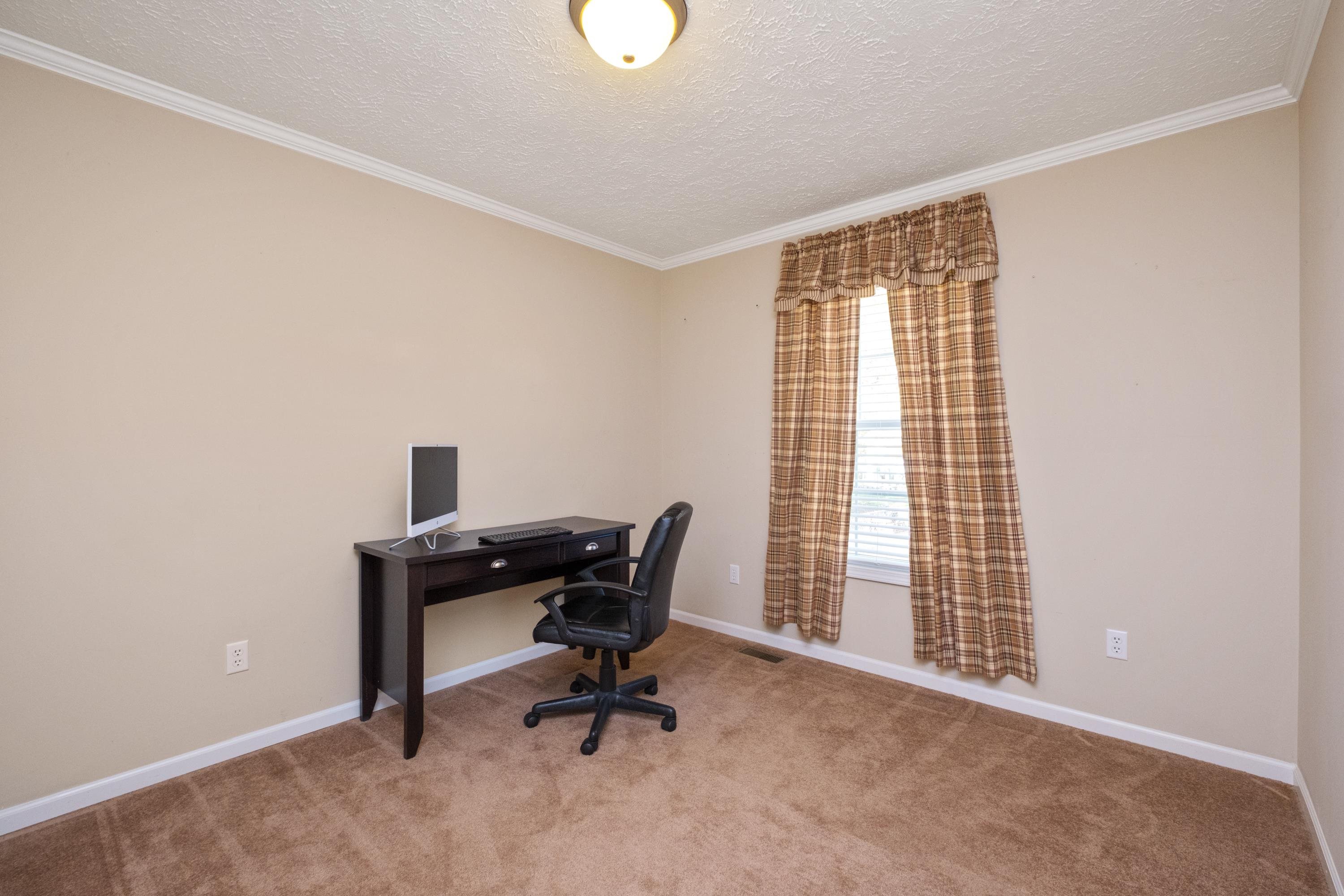 1715 3rd Street Waynesboro, VA 22980 - Photo 25 of 33 a view of workspace with a window