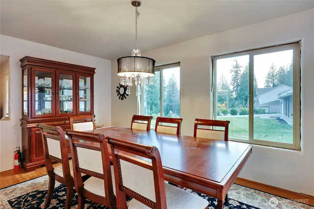 a spacious bedroom with a bed and a window