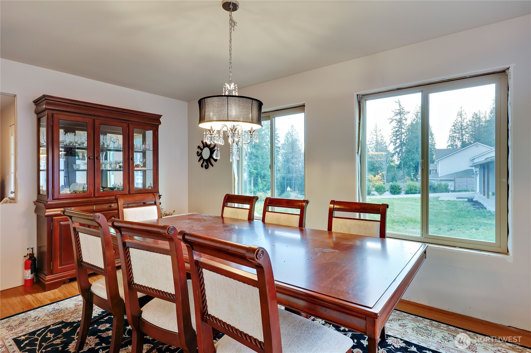 20919 President Point Road Northeast Kingston, WA 98346 - Photo 11 of 24 a view of a dining room with furniture window and outside view