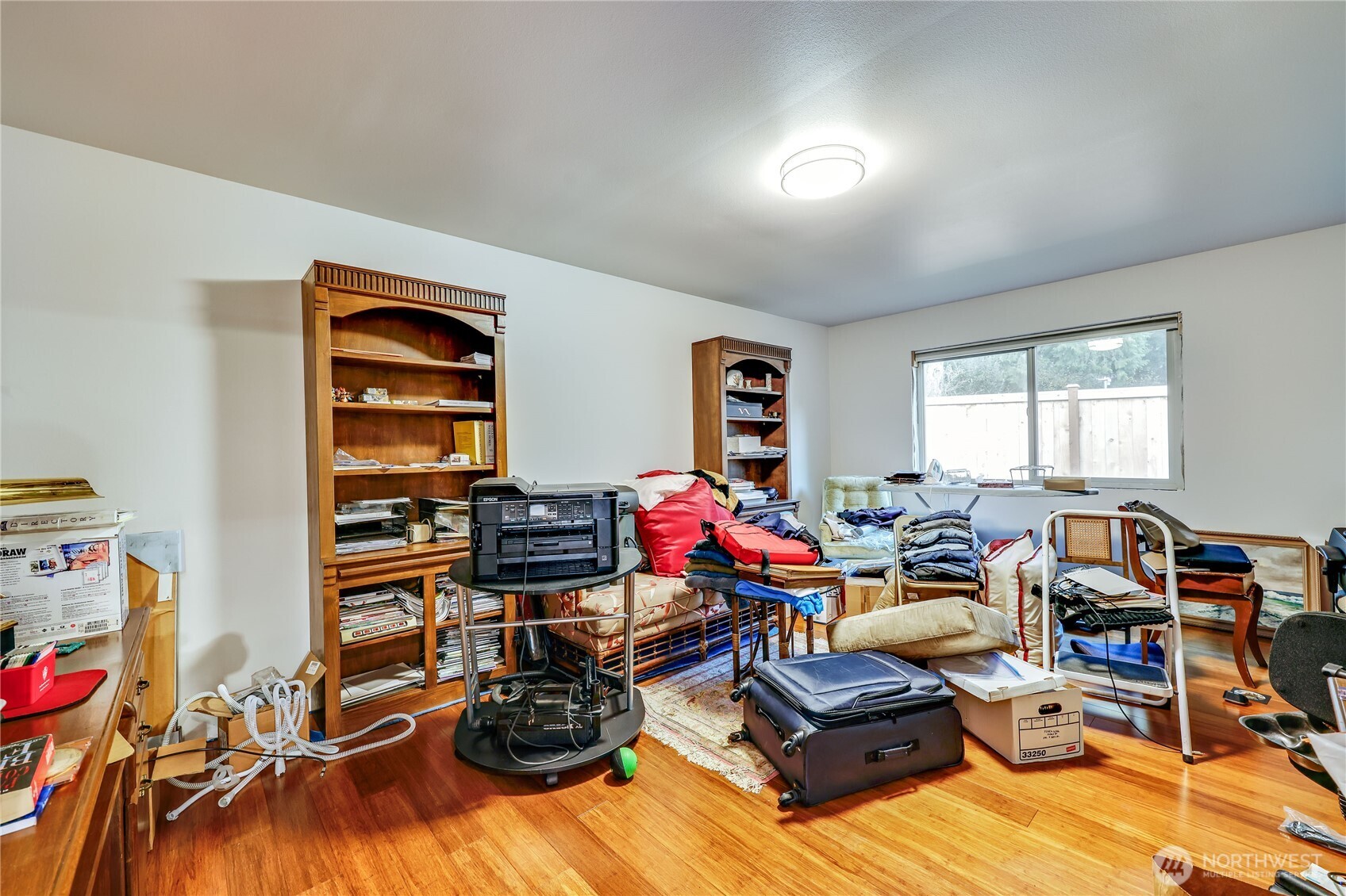20919 President Point Road Northeast Kingston, WA 98346 - Photo 18 of 24 a living room with furniture and a wooden floor