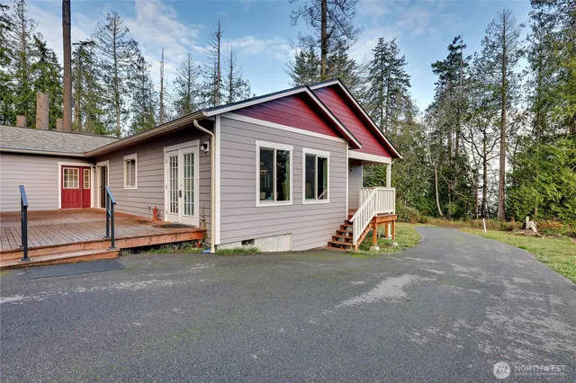 a view of a lake with a yard