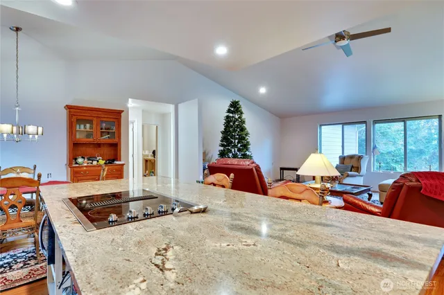 a bed room with two beds and a large window