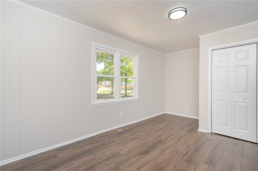 113 Linda Lane Honea Path, SC 29654 - Photo 15 of 36 This bright room features durable flooring and a window offering a peaceful neighborhood view.