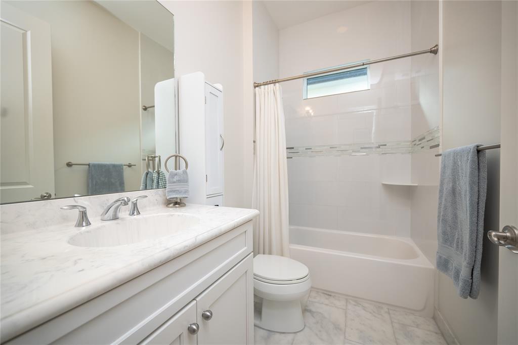 6359 Bellamalfi Street Boca Raton, FL 33496 - Photo 47 of 86 a bathroom with a sink a toilet and shower