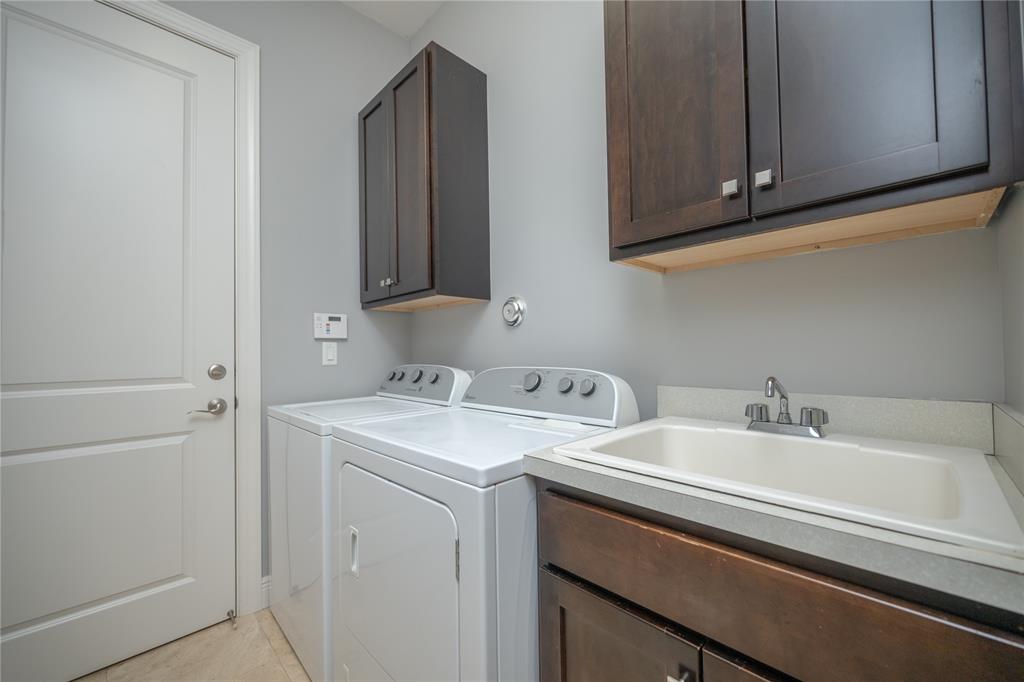 6359 Bellamalfi Street Boca Raton, FL 33496 - Photo 50 of 86 a utility room with dryer and washer
