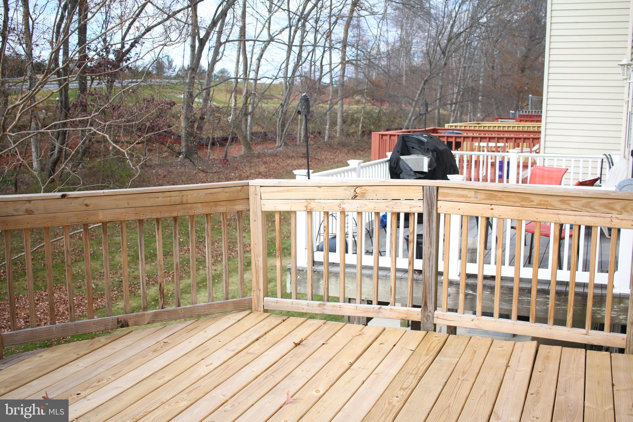 3666 Marpat Drive Abingdon, MD 21009 - Photo 14 of 30 a view of roof deck with wooden floor and fence