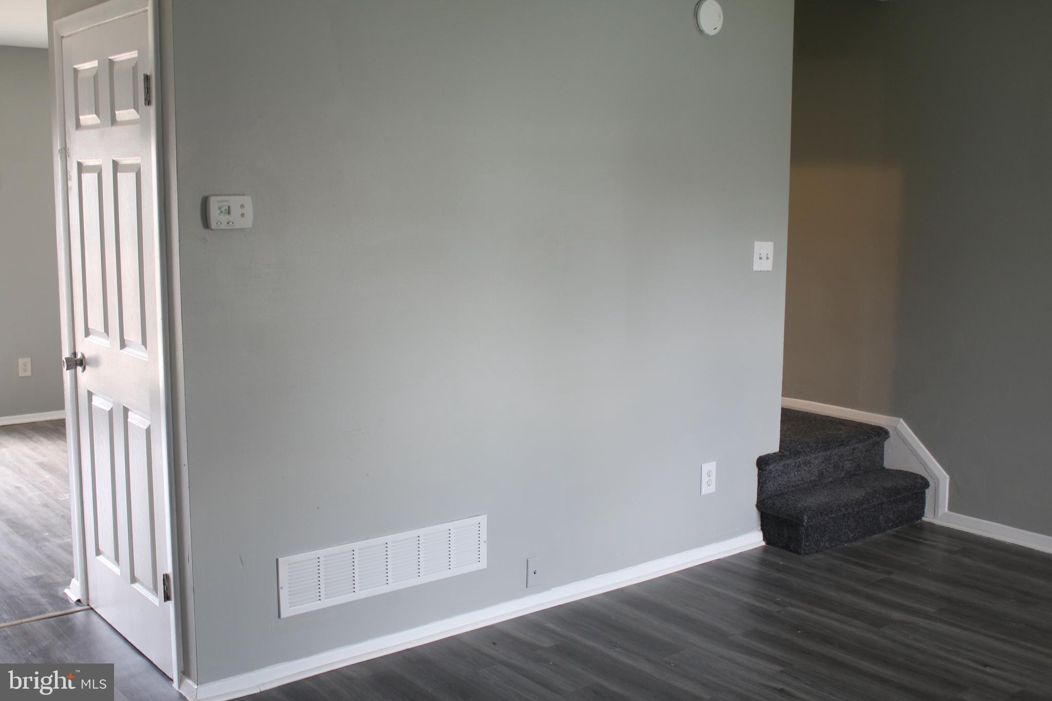 3666 Marpat Drive Abingdon, MD 21009 - Photo 6 of 30 a view of an empty room with wooden floor and a window