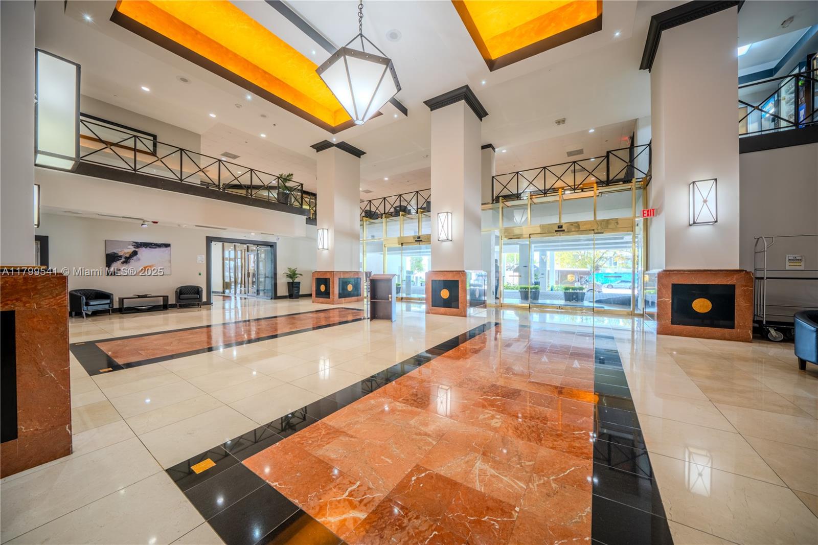 555 Northeast 15th Street, Unit 508 Miami, FL 33132 - Photo 23 of 25 a swimming pool with outdoor seating and a patio