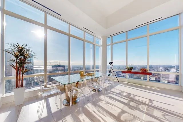 a room with view of living room and furniture