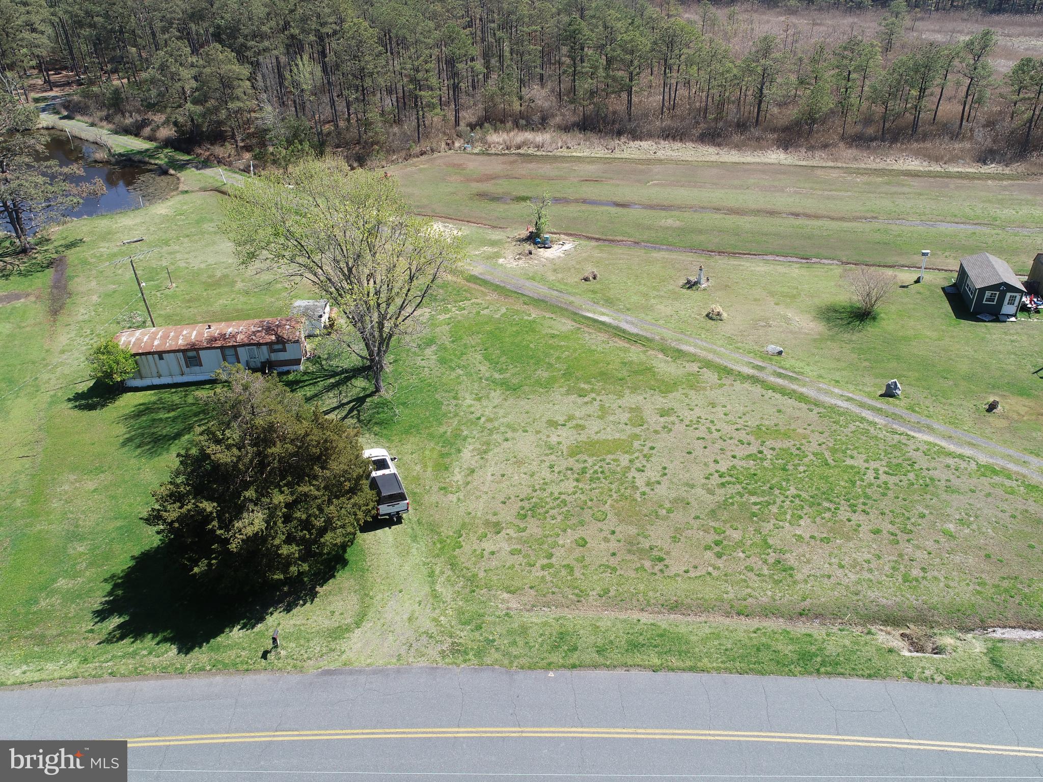 2839 Lakesville-Crapo Road Crapo, MD 21626 - Photo 41 of 50 a view of a garden with an outdoor seating