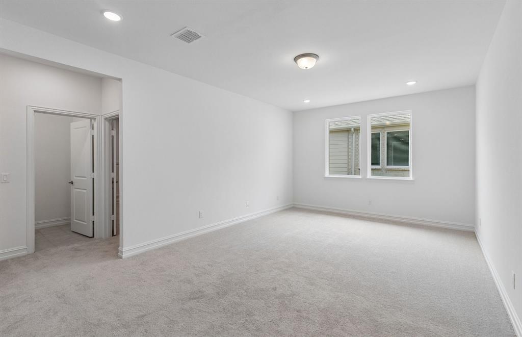 11220 Abbotsbury Road Fort Worth, TX 76052 - Photo 18 of 32 a view of an empty room with a window