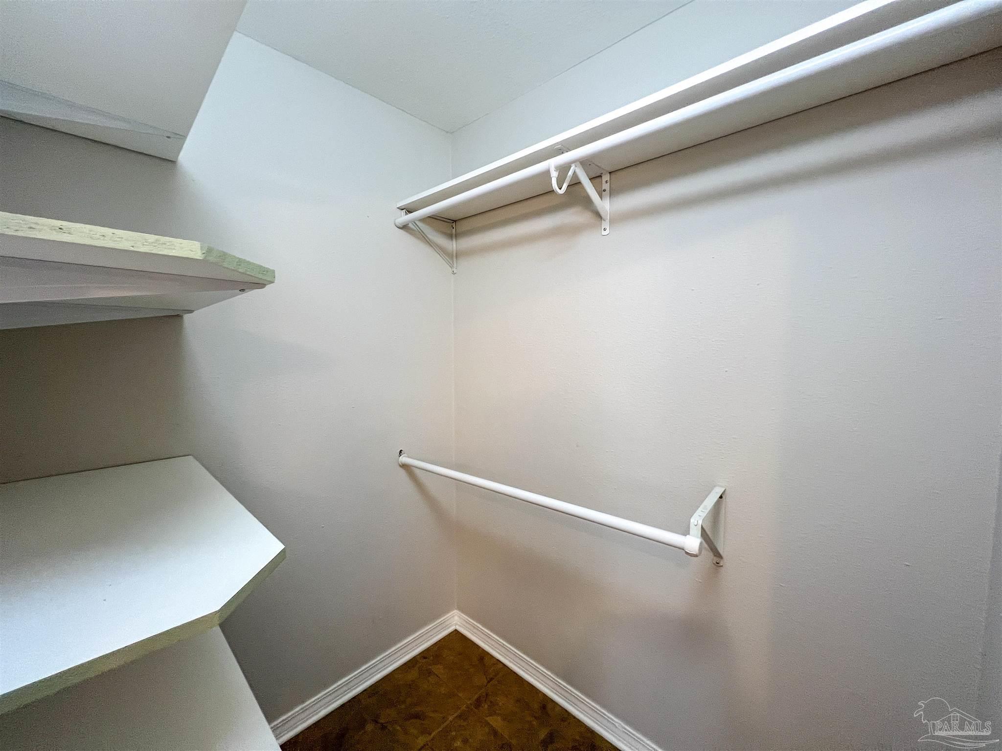 2967 Creole Way Pensacola, FL 32526 - Photo 20 of 30 a view of small space with racks on the wall