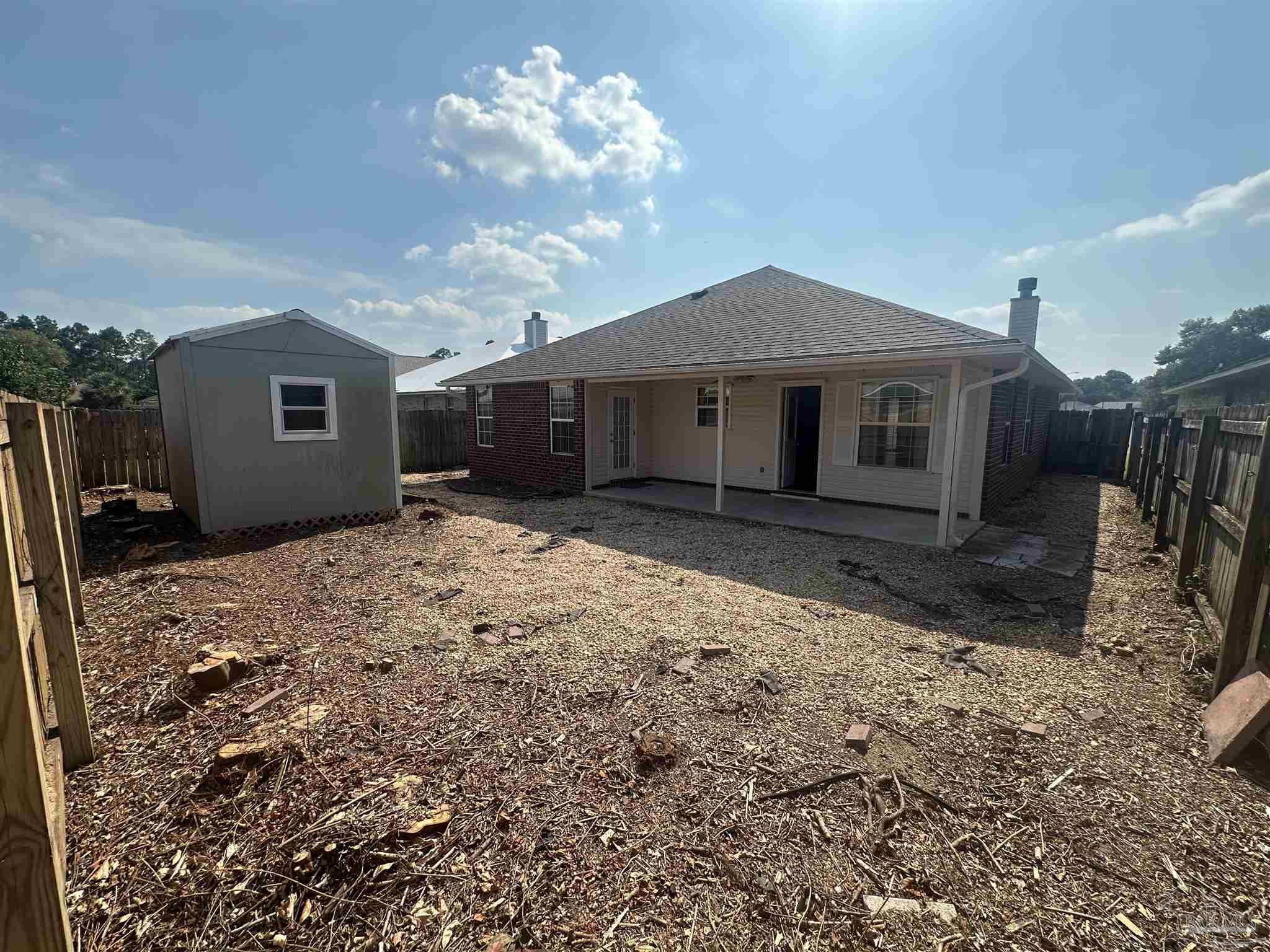 2967 Creole Way Pensacola, FL 32526 - Photo 29 of 30 a view of a house with a yard