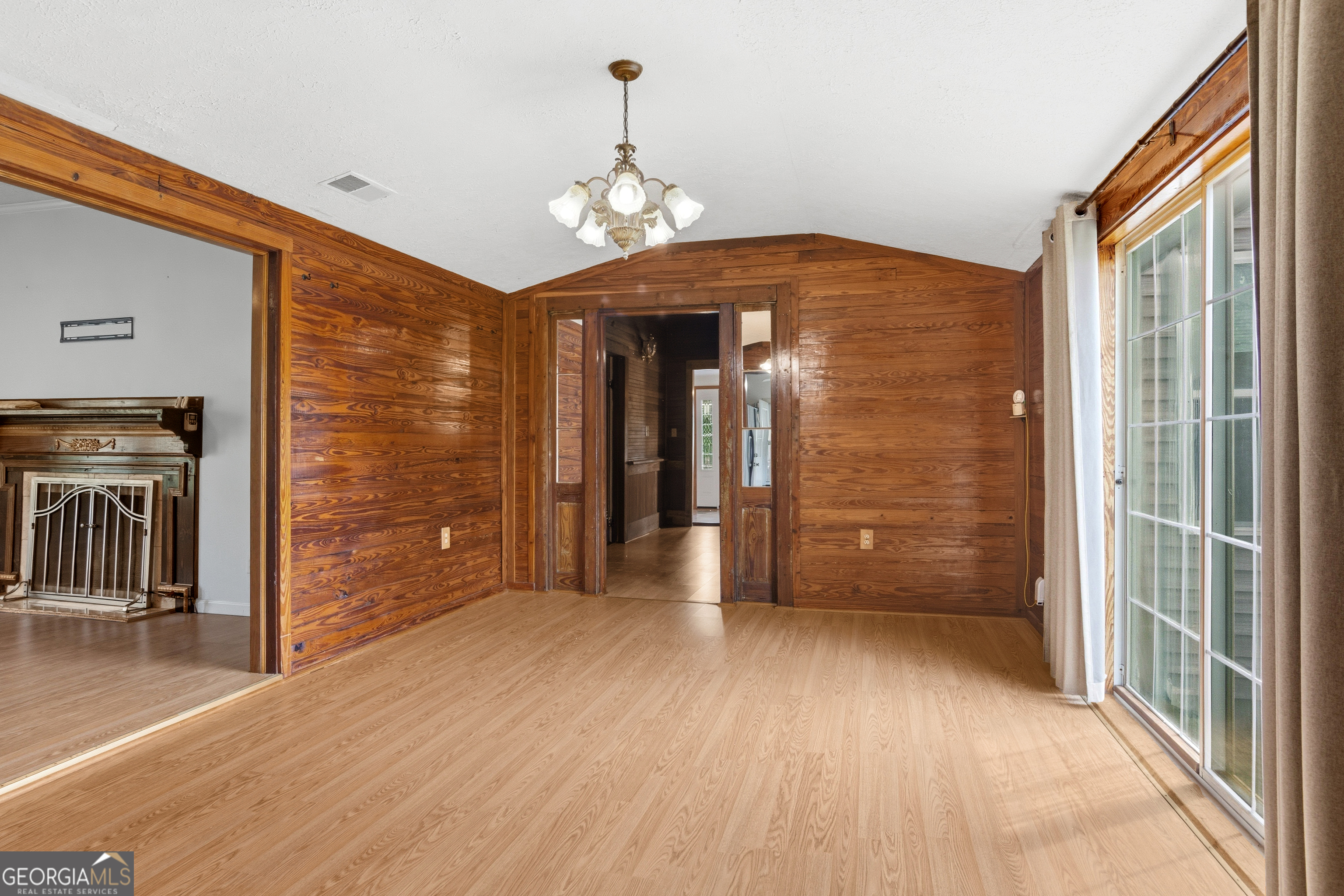 2010 Page Road Harrison, GA 31035 - Photo 45 of 59 a view of a hallway with wooden floor and staircase