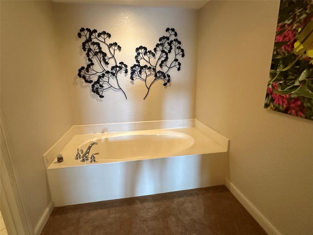 7727 Southampton Terrace, Unit 303 Tamarac, FL 33321 - Photo 14 of 23 close up of a bathtub in a bathroom