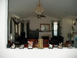 597 Anderson Way Rio Vista, CA 94571 - Photo 3 of 6 a room with furniture and a fireplace