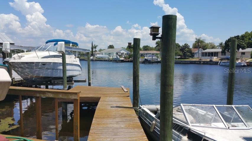 5514 Riddle Road Holiday, FL 34690 - Photo 1 of 1 a view of a lake from a balcony