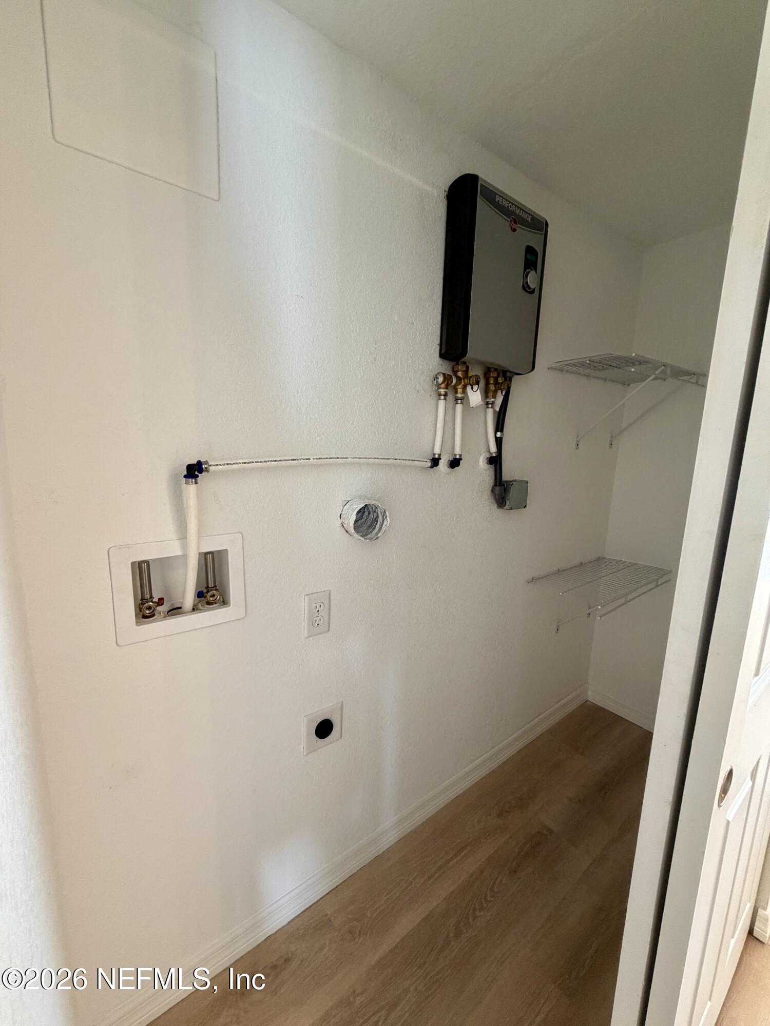 153 Twine Street St. Augustine, FL 32084 - Photo 15 of 30 Primary Bath Closet & Laundry Hook-up
