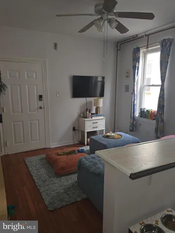 a kitchen with a sink appliances and cabinets