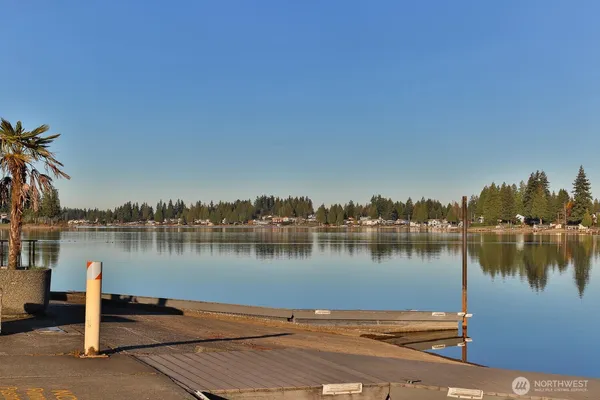 a view of a lake with houses with outdoor space