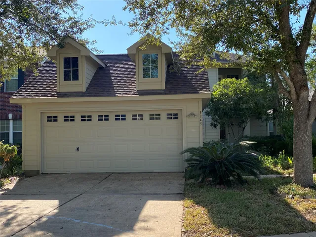 a front view of house with yard