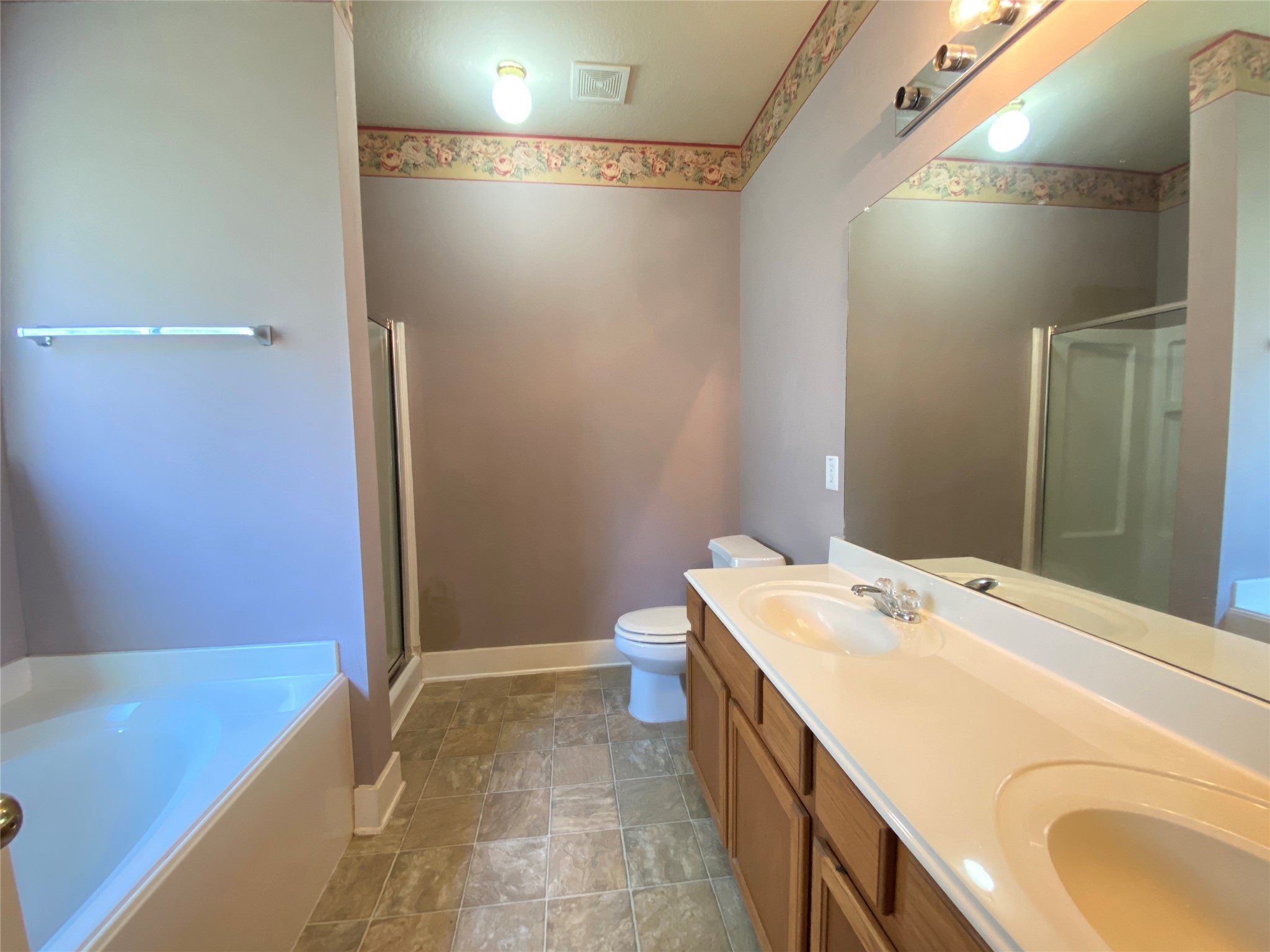 5843 Sonoma Ridge Missouri City, TX 77459 - Photo 16 of 20 a bathroom with a tub sink and mirror