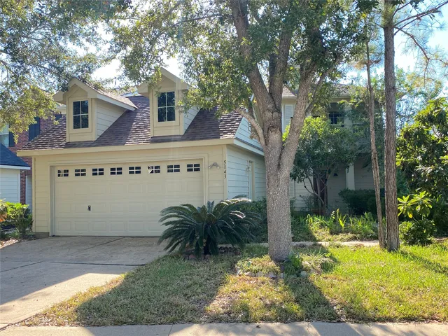 a front view of house with yard
