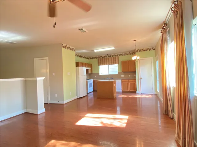 a view of kitchen with furniture and a window