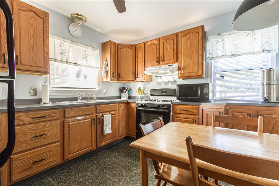 175 Curlew Street Rochester, NY 14613 - Photo 18 of 35 AMPLE STORAGE SPACE WITH BEAUTIFUL WOOD CABINETRY
