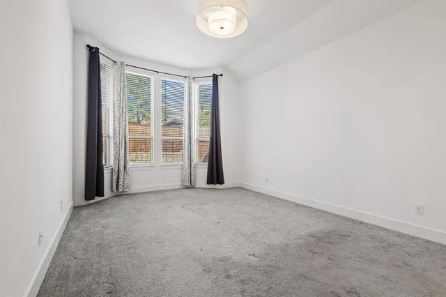 a bathroom with a double vanity sink a mirror and a shower