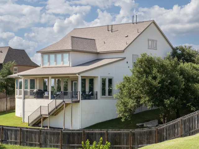 a view of a garden from a balcony