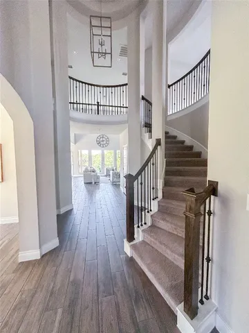 a view of entryway with wooden floor