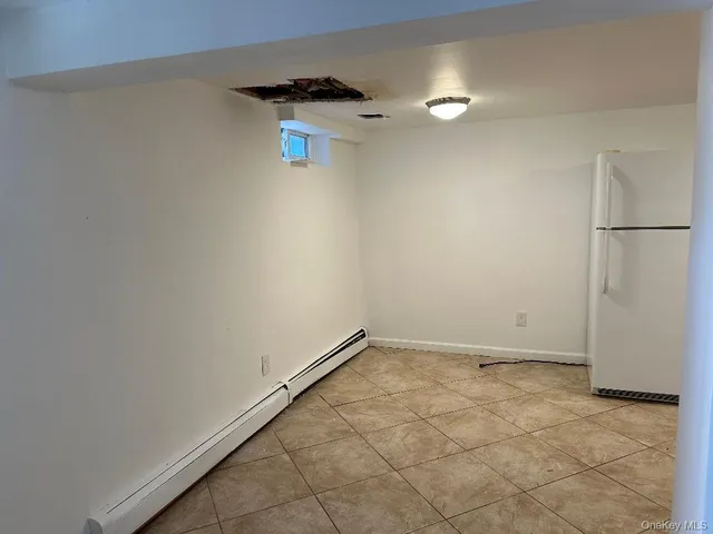 a kitchen with appliances cabinets and appliances