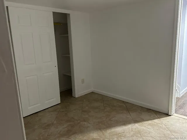 a view of a utility room with window