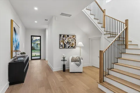 a bathroom with a bathtub and shower