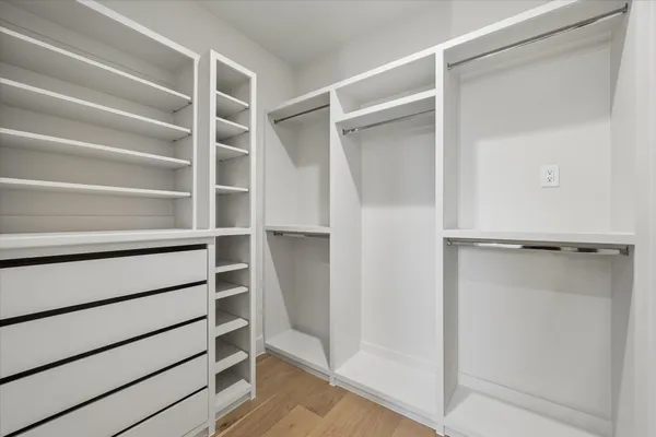 a room with furniture and view of living room