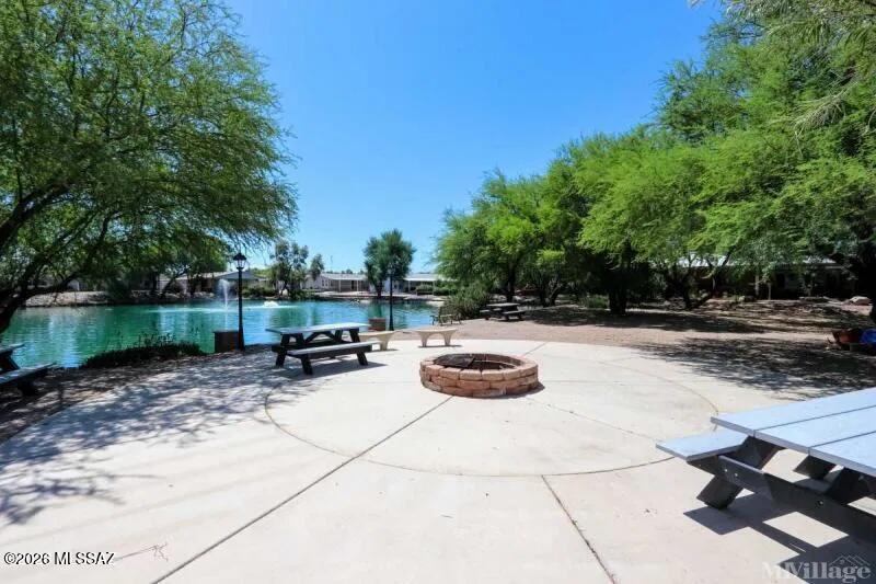 8401 South Kolb Road, Unit 61 Tucson, AZ 85756 - Photo 23 of 23 a view of backyard with swimming pool and seating space