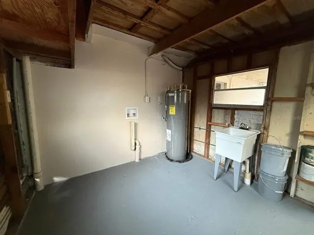 a view of an empty room with a chair