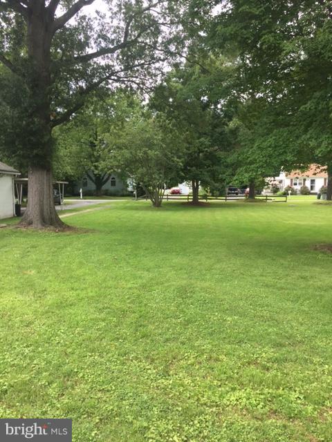 1035 Chester Road Baltimore, MD 21220 - Photo 4 of 7 a view of field with trees in the background