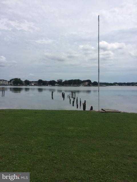 1035 Chester Road Baltimore, MD 21220 - Photo 6 of 7 a view of a lake with houses in background