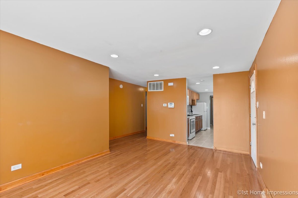 16640 Marshfield Avenue Markham, IL 60428 - Photo 8 of 20 a view of empty room with wooden floor