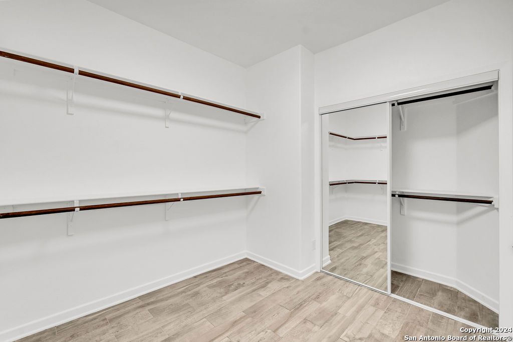 1303 Summerfield San Antonio, TX 78258 - Photo 15 of 27 a view of an empty walk in closet