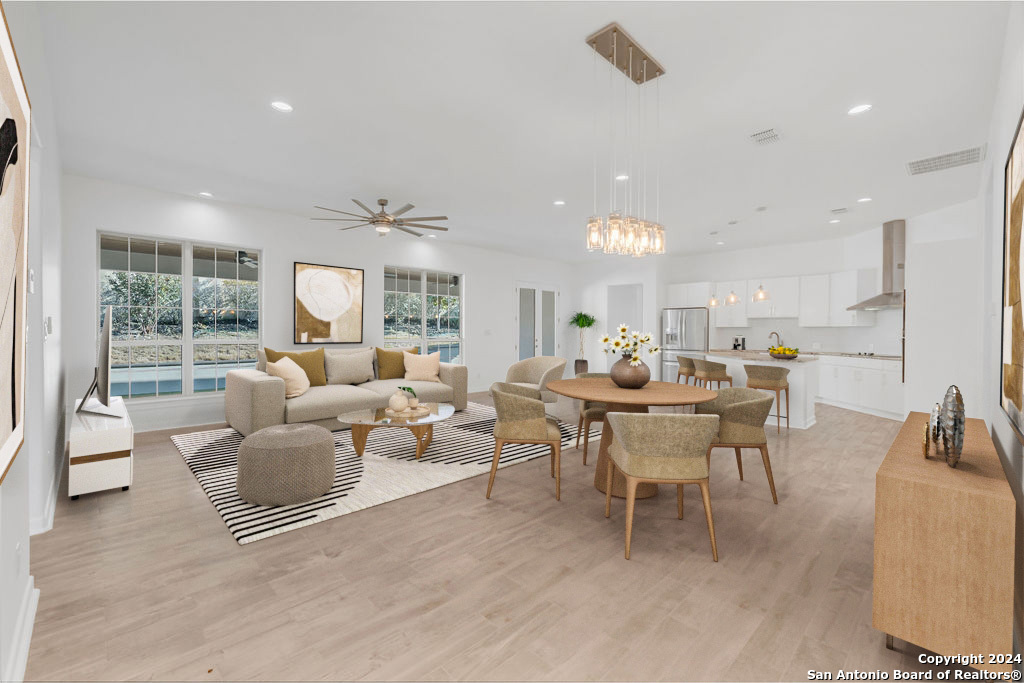 1303 Summerfield San Antonio, TX 78258 - Photo 3 of 27 a living room with furniture and a large window