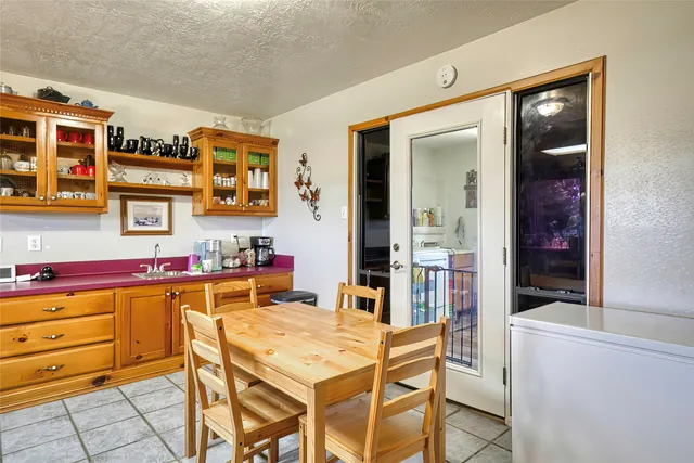 a bedroom with a bed and a potted plant