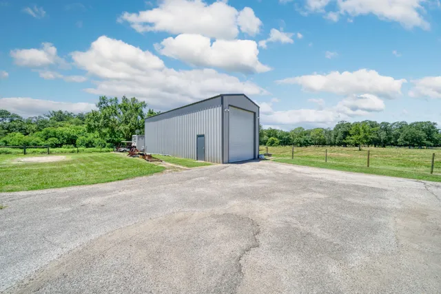 a view of workspace with furniture and window