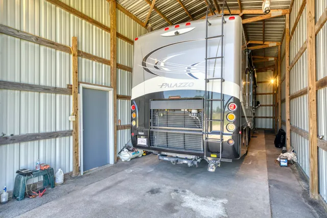 a livingroom with furniture and window