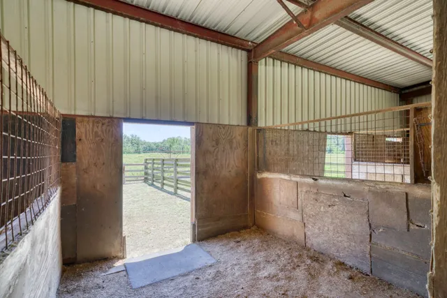 a view of a golf course with a lake view