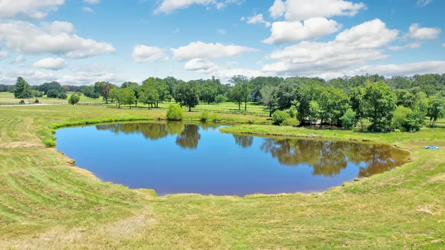 a view of a lake with a big yard